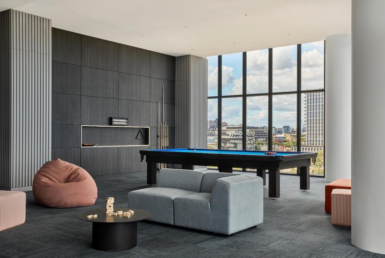 Oakwood Premier Melbourne Aparthotel Exterior photo The pool table at the top of the building