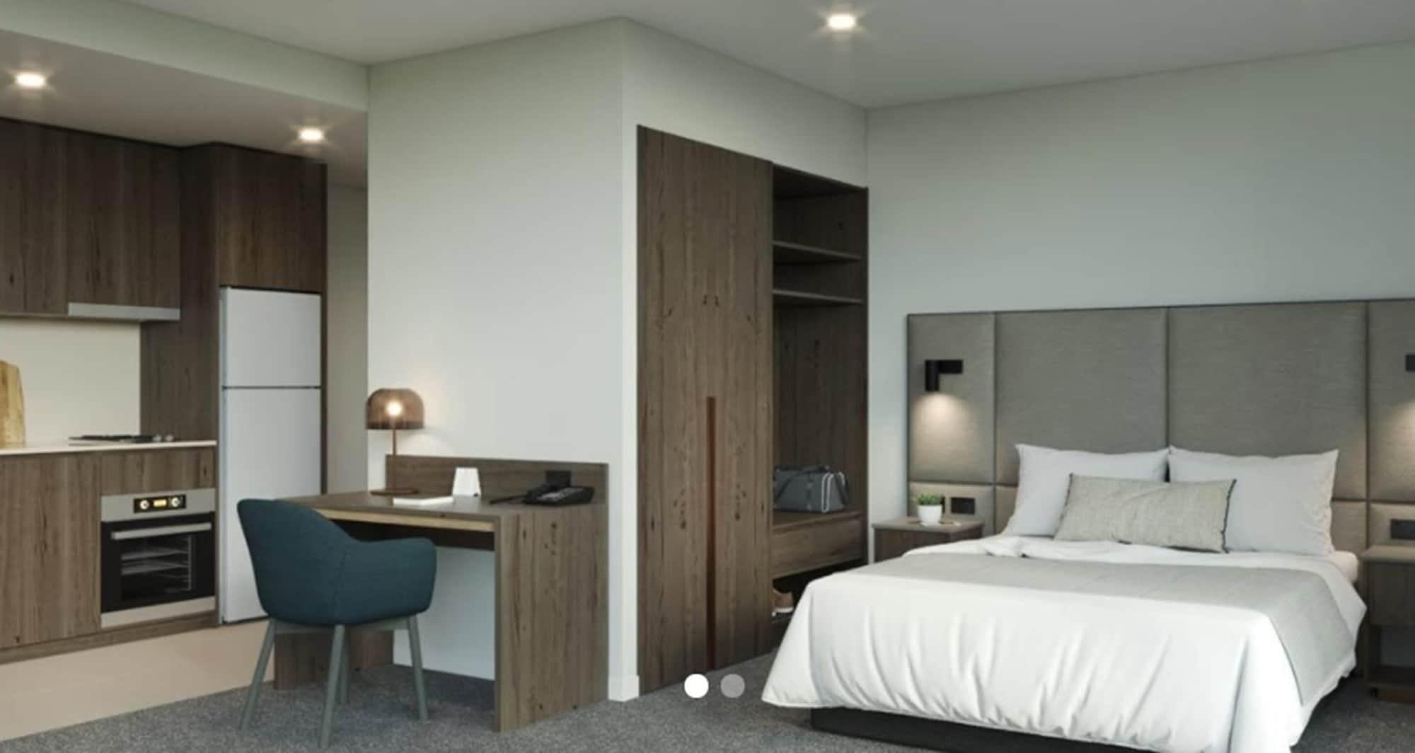 Oakwood Premier Melbourne Aparthotel Exterior photo A typical bedroom at the hotel
